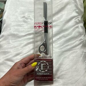 NEW Centrix Rotorazor worth 10 quick slide blades.